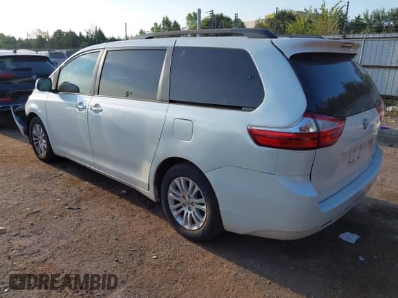 2015 Toyota Sienna XLE with VIN 5TDYK3DC5FS644523, listed as a IAAI auction lot 43248015 with 106,854 mi miles and . Bid and sale history available at DreamBid. Image 3.