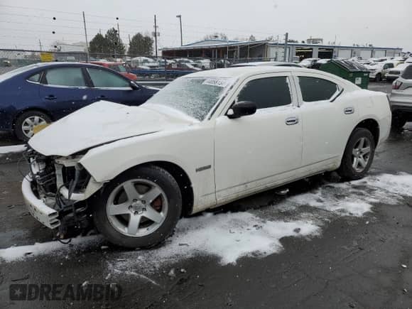 2009 Dodge Charger SXT with VIN 2B3KA33V39H626960, listed as a Copart auction lot 44058134 with 203,008 mi miles and Salvage title. Bid and sale history available at DreamBid. Image 1.