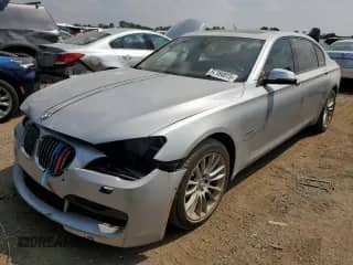 2015 BMW 7 Series 750Li with VIN WBAYE8C56FD782359, listed as a Copart auction lot 67184815 with 77,457 mi miles and Salvage title. Bid and sale history available at DreamBid. Image 1.