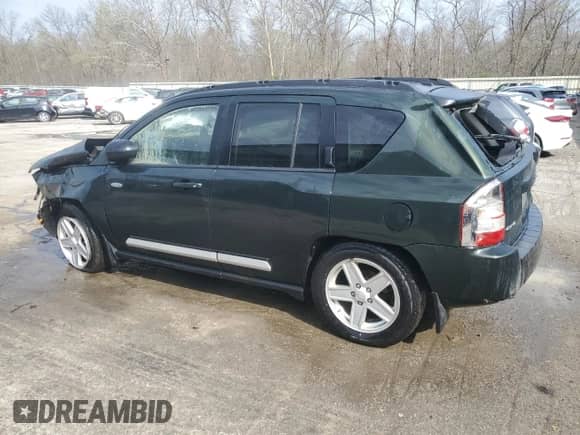 2010 Jeep Compass Latitude с VIN 1J4NF1FB2AD671550, выставлен на аукционе Copart как лот 53055385 с пробегом 82 127 миль миль и Списание • Salvage title. История ставок и продаж доступна на DreamBid. Изображение 2.