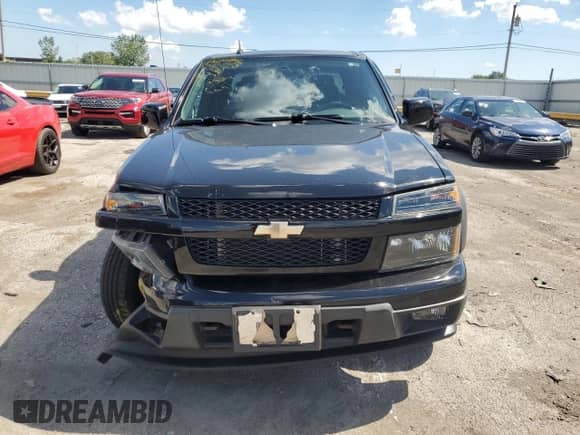 2010 Chevrolet Colorado 1LT z VIN 1GCJTCDEXA8112763, wystawiony jako Copart lot #71072325 z przebiegiem 84 601 mil mil oraz Szkoda całkowita • Salvage title. Historia ofert i sprzedaży dostępna na DreamBid. Obrazek 5.