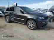 2012 Jeep Grand Cherokee SRT-8 z VIN 1C4RJFDJ7CC100156, wystawiony jako Copart lot #79865954 z przebiegiem 113 782 mil mil oraz Szkoda całkowita • Salvage title. Historia ofert i sprzedaży dostępna na DreamBid. Obrazek 4.