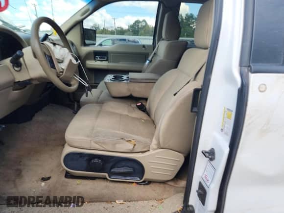 2007 Ford F-150 STX with VIN 1FTRX12W57FA37403, listed as a Copart auction lot 84213265 with 2,342,455 mi miles and Salvage title. Bid and sale history available at DreamBid. Image 7.