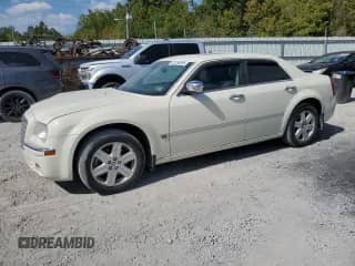 2005 Chrysler 300 300C AWD with VIN 2C3JK63HX5H647421, listed as a Copart auction lot 81134595 with 179,457 mi miles and Salvage title. Bid and sale history available at DreamBid. Image 1.