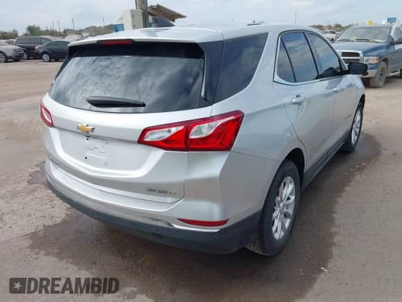 2018 Chevrolet Equinox LT with VIN 3GNAXJEV0JS544445, listed as a IAAI auction lot 40983664 with 105,832 mi miles and . Bid and sale history available at DreamBid. Image 4.