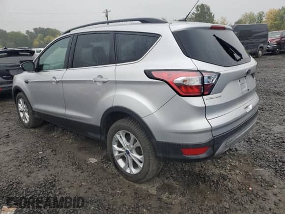 2018 Ford Escape SE с VIN 1FMCU9GD6JUA73829, выставлен на аукционе Copart как лот 90040835 с пробегом 84 854 миль миль и Чистый • Clean title. История ставок и продаж доступна на DreamBid. Изображение 2.