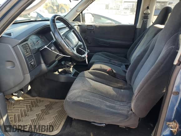 2003 Dodge Dakota with VIN 1D7GG32NX3S252020, listed as a Copart auction lot 83869424 with 258,061 mi miles and Salvage title. Bid and sale history available at DreamBid. Image 7.