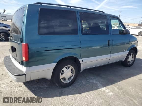 1999 Chevrolet Astro с VIN 1GNDM19W2XB163709, выставлен на аукционе Copart как лот 77155804 с пробегом 224 198 миль миль и Списание • Salvage title. История ставок и продаж доступна на DreamBid. Изображение 3.