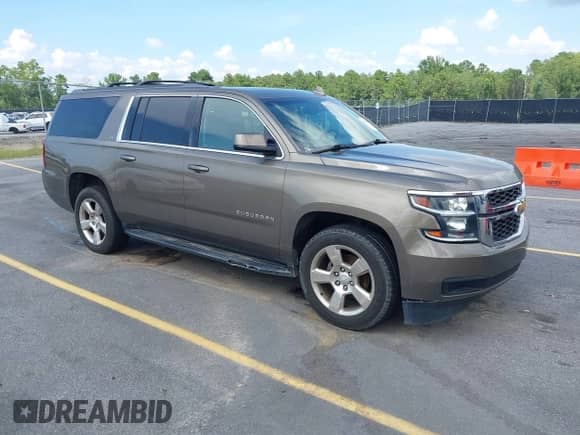 2016 Chevrolet Suburban LT z VIN 1GNSCHKCXGR346074, wystawiony jako IAAI lot #42721809 z przebiegiem 130 514 mil mil oraz . Historia ofert i sprzedaży dostępna na DreamBid. Obrazek 1.