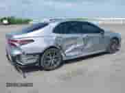 2021 Toyota Camry Hybrid XLE with VIN 4T1F31AK5MU565376, listed as a IAAI auction lot 42687616 with 57,880 mi miles and . Bid and sale history available at DreamBid. Image 6.