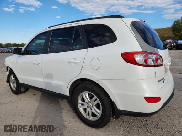2012 Hyundai Santa Fe GLS z VIN 5XYZG3AB4CG119589, wystawiony jako Copart lot #84960285 z przebiegiem 147 864 mil mil oraz Szkoda całkowita • Salvage title. Historia ofert i sprzedaży dostępna na DreamBid. Obrazek 2.