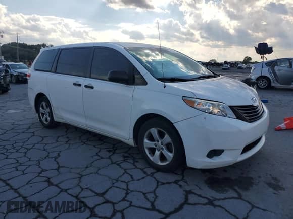 2012 Toyota Sienna with VIN 5TDZK3DC2CS184186, listed as a Copart auction lot 71013535 with 172,772 mi miles and Salvage title. Bid and sale history available at DreamBid. Image 4.