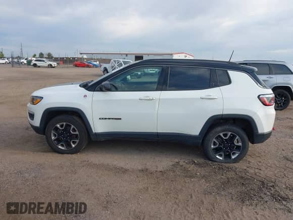 2018 Jeep Compass Trailhawk z VIN 3C4NJDDB8JT234574, wystawiony jako IAAI lot #43049041 z przebiegiem 93 968 mil mil oraz . Historia ofert i sprzedaży dostępna na DreamBid. Obrazek 14.