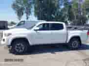 2017 Toyota Tacoma SR5 with VIN 3TMAZ5CN1HM037971, listed as a IAAI auction lot 42658632 with 67,228 mi miles and . Bid and sale history available at DreamBid. Image 14.