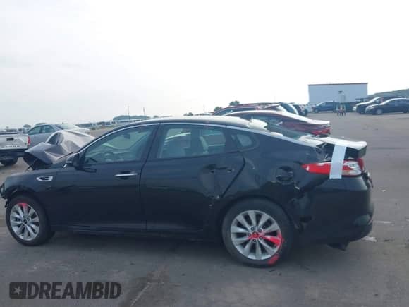 2016 Kia Optima EX with VIN 5XXGU4L36GG070739, listed as a IAAI auction lot 42765882 with 64,815 mi miles and . Bid and sale history available at DreamBid. Image 14.