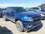 2019 Chevrolet Colorado 4WD LT z VIN 1GCGTCEN2K1121458, wystawiony jako IAAI lot #42839112 z przebiegiem 88 987 mil mil oraz . Historia ofert i sprzedaży dostępna na DreamBid. Obrazek 1.