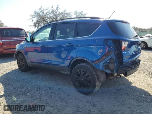 2017 Ford Escape SE с VIN 1FMCU9G94HUE51037, выставлен на аукционе Copart как лот 82643175 с пробегом 113 996 миль миль и Списание • Salvage title. История ставок и продаж доступна на DreamBid. Изображение 2.