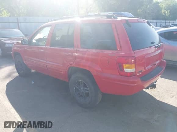 2000 Jeep Grand Cherokee Limited z VIN 1J4GW58N5YC186410, wystawiony jako IAAI lot #42504152 z przebiegiem 140 982 mil mil oraz . Historia ofert i sprzedaży dostępna na DreamBid. Obrazek 3.