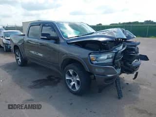 2021 Ram 1500 Laramie z VIN 1C6SRFJT3MN534250, wystawiony jako IAAI lot #42799491 z przebiegiem 66 551 mil mil oraz . Historia ofert i sprzedaży dostępna na DreamBid. Obrazek 1.