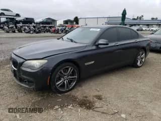 2011 BMW 7 Series 750i with VIN WBAKA8C5XBCY36778, listed as a Copart auction lot 86220094 with 95,536 mi miles and Salvage title. Bid and sale history available at DreamBid. Image 1.