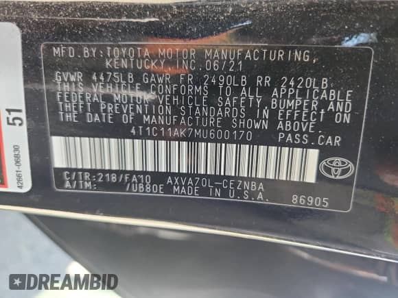 2021 Toyota Camry LE z VIN 4T1C11AK7MU600170, wystawiony jako Copart lot #81105525 z przebiegiem 87 517 mil mil oraz Szkoda całkowita • Salvage title. Historia ofert i sprzedaży dostępna na DreamBid. Obrazek 12.