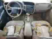 2001 Chevrolet Blazer LT with VIN 1GNCS13W312132549, listed as a Copart auction lot 90613665 with 207,148 mi miles and Salvage title. Bid and sale history available at DreamBid. Image 8.