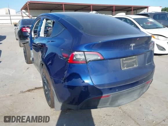 2022 Tesla Model Y Long Range z VIN 7SAYGDEE9NF443673, wystawiony jako IAAI lot #42878246 z przebiegiem 65 689 mil mil oraz . Historia ofert i sprzedaży dostępna na DreamBid. Obrazek 3.
