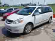 2007 Toyota Sienna XLE z VIN 5TDZK22C87S082670, wystawiony jako IAAI lot #42340249 z przebiegiem 227 064 mil mil oraz . Historia ofert i sprzedaży dostępna na DreamBid. Obrazek 2.