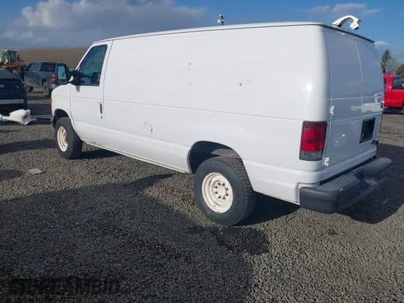 2007 Ford Econoline Cargo Commercial with VIN 1FTNE24W97DA99597, listed as a IAAI auction lot 41700355 with 324,085 mi miles and . Bid and sale history available at DreamBid. Image 3.