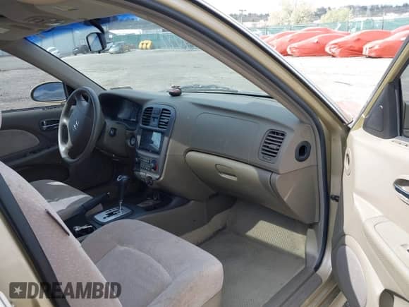 2003 Hyundai Sonata with VIN KMHWF25S73A753534, listed as a IAAI auction lot 42044420 with 39,690 mi miles and . Bid and sale history available at DreamBid. Image 5.