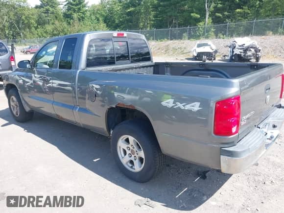 2006 Dodge Dakota SLT with VIN 1D7HW42K26S516242, listed as a IAAI auction lot 43079351 with 104,287 mi miles and . Bid and sale history available at DreamBid. Image 3.