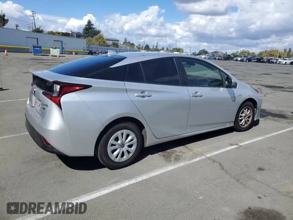 2019 Toyota Prius L Eco с VIN JTDKARFU9K3085328, выставлен на аукционе Copart как лот 82207835 с пробегом 177 544 миль миль и Списание • Salvage title. История ставок и продаж доступна на DreamBid. Изображение 3.