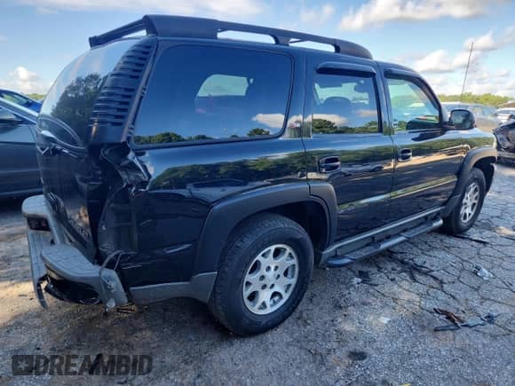 2005 Chevrolet Tahoe LT с VIN 1GNEC13T85R219243, выставлен на аукционе Copart как лот 66396395 с пробегом 298 084 миль миль и Списание • Salvage title. История ставок и продаж доступна на DreamBid. Изображение 3.