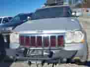 2009 Jeep Grand Cherokee with VIN 1J8HR68T39C540795, listed as a IAAI auction lot 41379112 with 236,624 mi miles and . Bid and sale history available at DreamBid. Image 12.