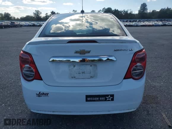 2015 Chevrolet Sonic LT с VIN 1G1JC5SG6F4115778, выставлен на аукционе Copart как лот 71699855 с пробегом 31 798 миль миль и Списание • Salvage title. История ставок и продаж доступна на DreamBid. Изображение 6.