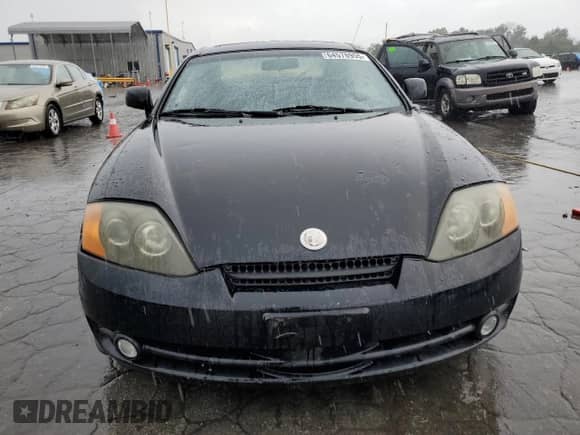 2004 Hyundai Tiburon GT с VIN KMHHN65F04U116247, выставлен на аукционе Copart как лот 64578955 с пробегом 238 388 миль миль и Списание • Salvage title. История ставок и продаж доступна на DreamBid. Изображение 5.