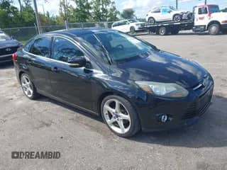 2013 Ford Focus Titanium with VIN 1FADP3J20DL295996, listed as a IAAI auction lot 43290832 with 150,000 mi miles and . Bid and sale history available at DreamBid. Image 1.
