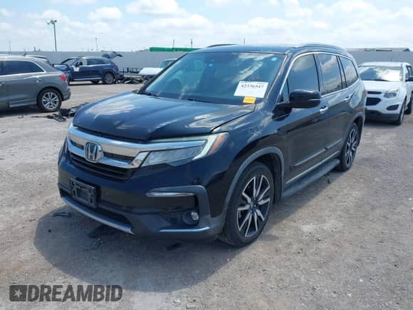 2020 Honda Pilot Elite with VIN 5FNYF6H0XLB032663, listed as a IAAI auction lot 42336547 with 102,386 mi miles and . Bid and sale history available at DreamBid. Image 17.