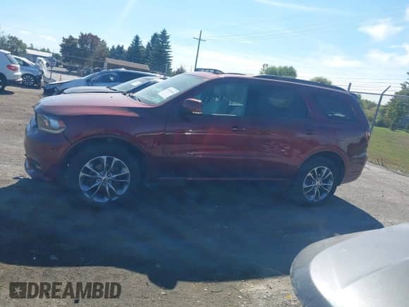 2020 Dodge Durango GT Plus with VIN 1C4RDJDGXLC412230, listed as a IAAI auction lot 43349305 with 70,628 mi miles and . Bid and sale history available at DreamBid. Image 14.