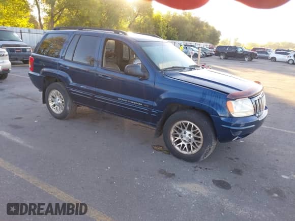 2002 Jeep Grand Cherokee Limited with VIN 1J4GW58N02C115476, listed as a IAAI auction lot 43394255 with Not provided miles and . Bid and sale history available at DreamBid. Image 1.