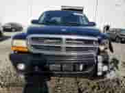 2002 Dodge Dakota SLT z VIN 1B7HG48Z42S670117, wystawiony jako Copart lot #75222474 z przebiegiem 91 094 mil mil oraz Szkoda całkowita • Salvage title. Historia ofert i sprzedaży dostępna na DreamBid. Obrazek 5.