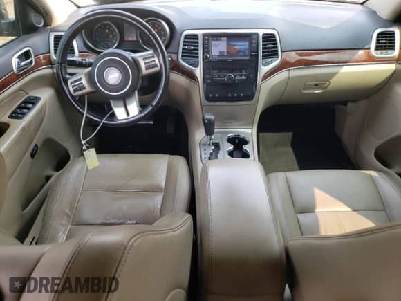 2013 Jeep Grand Cherokee Limited с VIN 1C4RJFBT9DC573112, выставлен на аукционе Copart как лот 66895085 с пробегом 163 767 миль миль и Списание • Salvage title. История ставок и продаж доступна на DreamBid. Изображение 8.