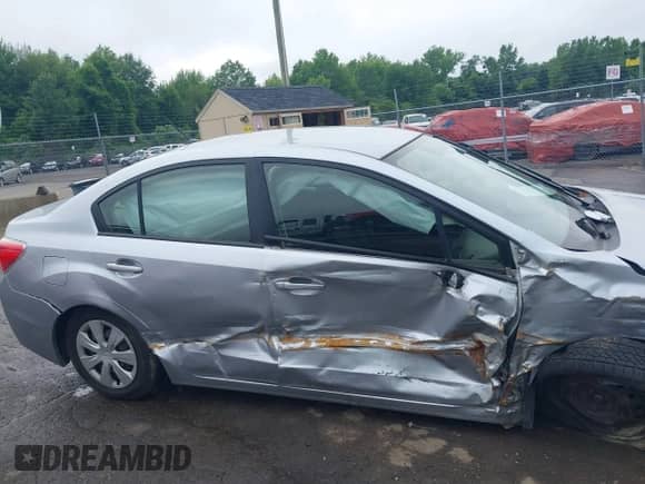 2014 Subaru Impreza with VIN JF1GJAA69EH014692, listed as a IAAI auction lot 42517943 with 89,172 mi miles and . Bid and sale history available at DreamBid. Image 12.