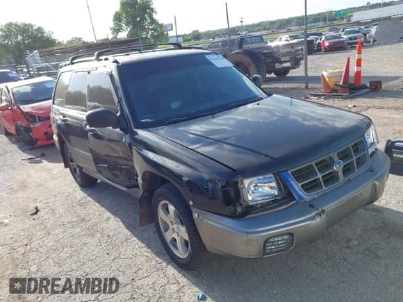 1999 Subaru Forester S with VIN JF1SF6552XH736647, listed as a IAAI auction lot 42565079 with 215,244 mi miles and . Bid and sale history available at DreamBid. Image 1.