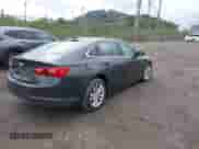 2018 Chevrolet Malibu LT z VIN 1G1ZD5ST6JF107433, wystawiony jako IAAI lot #43281943 z przebiegiem 59 802 mil mil oraz . Historia ofert i sprzedaży dostępna na DreamBid. Obrazek 4.