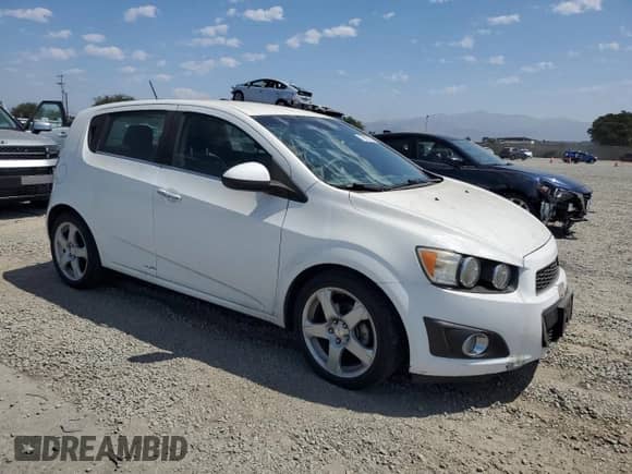 2015 Chevrolet Sonic LTZ with VIN 1G1JE6SB4F4122636, listed as a Copart auction lot 70532155 with 86,341 mi miles and Salvage title. Bid and sale history available at DreamBid. Image 4.