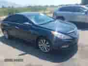 2012 Hyundai Sonata SE z VIN 5NPEC4AB9CH333664, wystawiony jako IAAI lot #42915240 z przebiegiem 130 250 mil mil oraz . Historia ofert i sprzedaży dostępna na DreamBid. Obrazek 1.