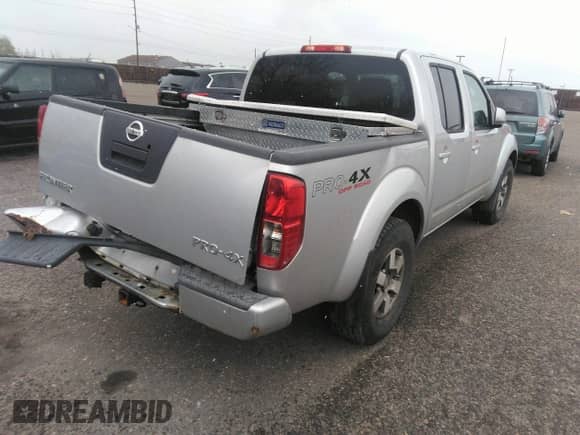 2011 Nissan Frontier Pro-4X with VIN 1N6AD0EV2BC438370, listed as a IAAI auction lot 41952484 with 217,529 mi miles and . Bid and sale history available at DreamBid. Image 4.