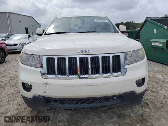2012 Jeep Grand Cherokee Laredo z VIN 1C4RJEAG3CC327590, wystawiony jako Copart lot #86103225 z przebiegiem 153 140 mil mil oraz Czysty tytuł • Clean title. Historia ofert i sprzedaży dostępna na DreamBid. Obrazek 5.