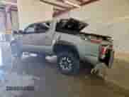 2021 Toyota Tacoma SR with VIN 5TFCZ5AN2MX251688, listed as a Copart auction lot 80790625 with 129,693 mi miles and Salvage title. Bid and sale history available at DreamBid. Image 2.